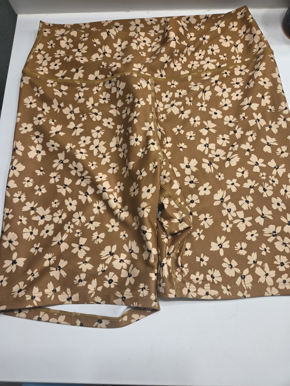 Sage Collective Women’s High-Rise Bike Shorts in Camel Floral